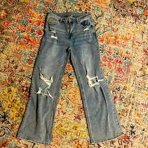 Distressed wide legged jeans…very trendy!